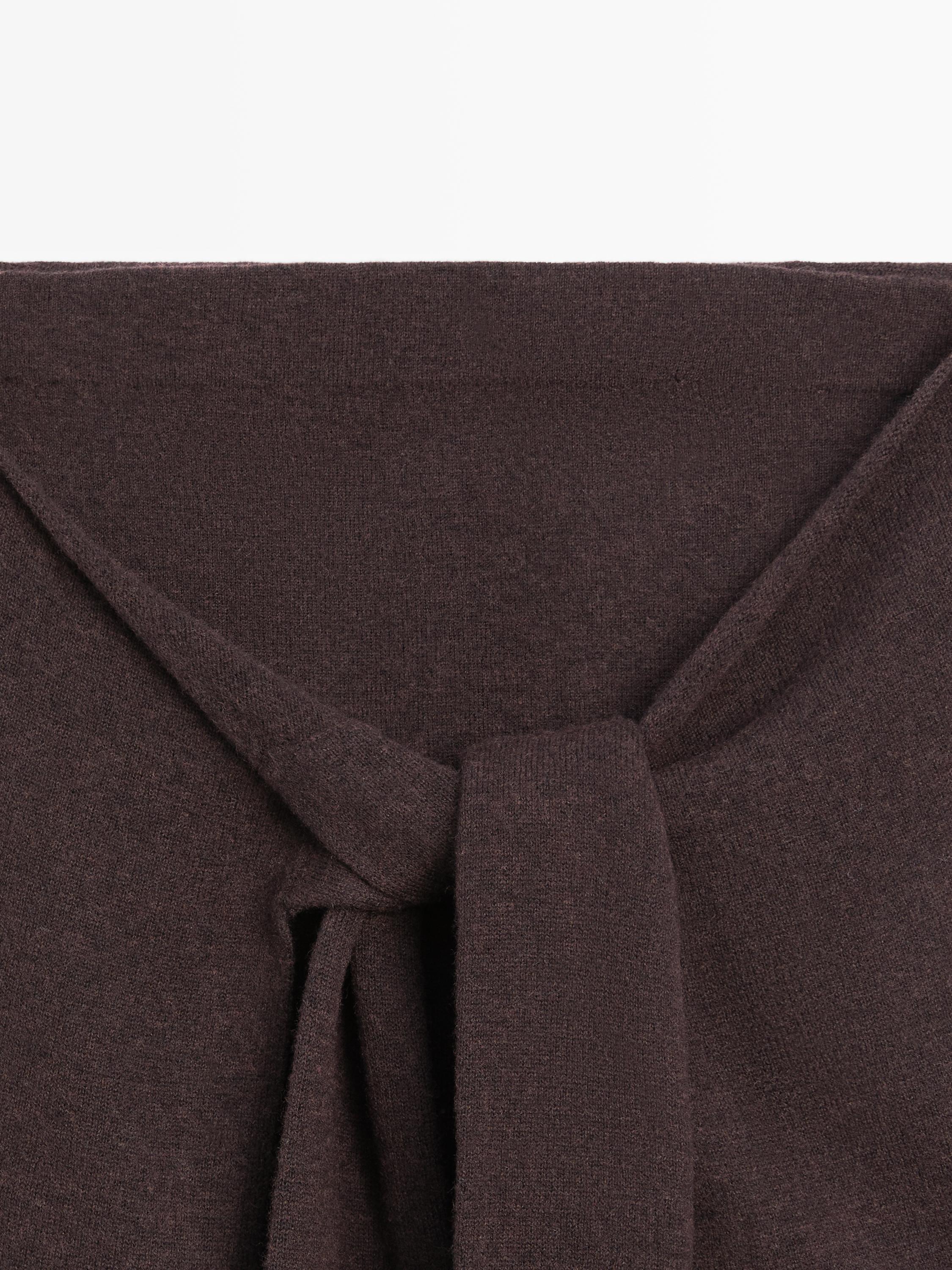 Knit skirt with knotted sleeve details